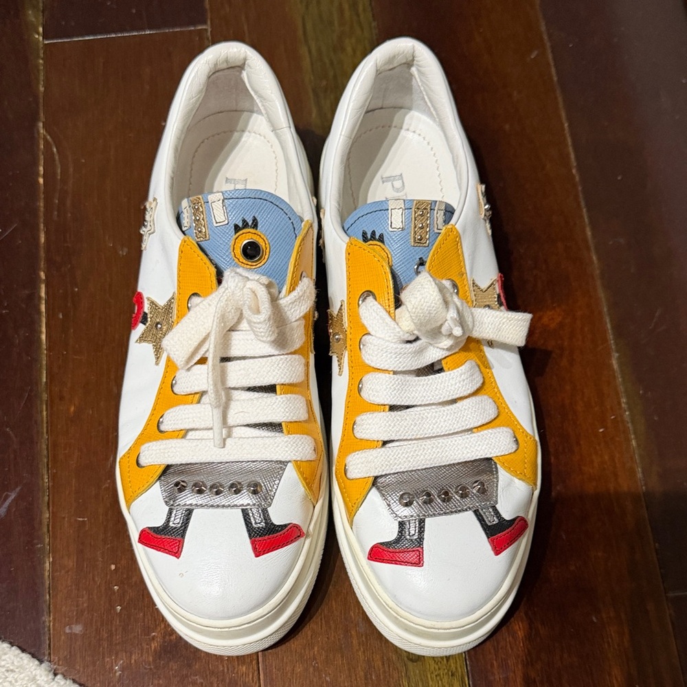 Prada women’s White and Yellow Robot Sneakers